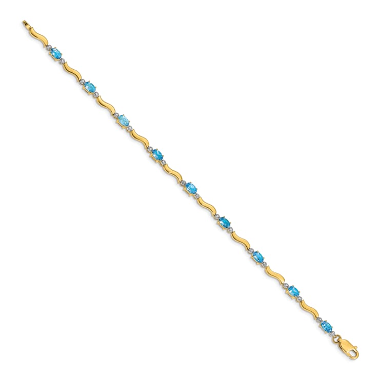 14k Yellow Gold and Rhodium Over 14k Yellow Gold Fancy Diamond and Blue
Topaz Bracelet