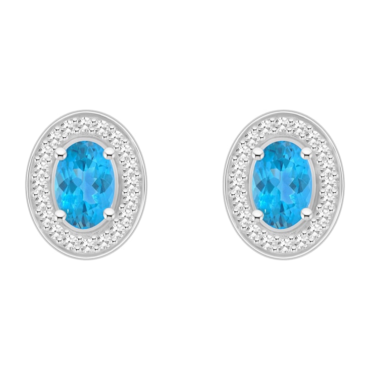 6x4mm Oval Blue Topaz 1/5 ctw Diamond Rhodium Over Sterling Silver Halo
Stud Earrings