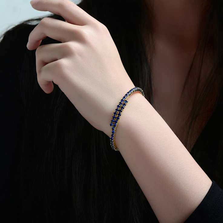 Sapphire Color CZ Bypass Tennis Bracelet In 14K Gold Over Brass