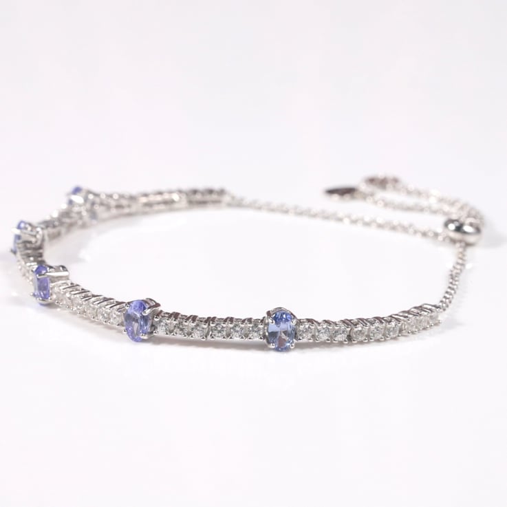 Rhodium Over Sterling Silver Oval Tanzanite and White Zircon Bolo
Bracelet 1.1ctw