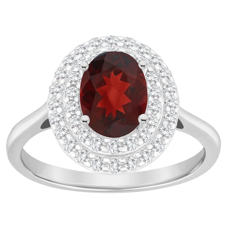 8x6mm Oval Garnet And White Topaz Accents Rhodium Over Sterling Silver
Double Halo Ring