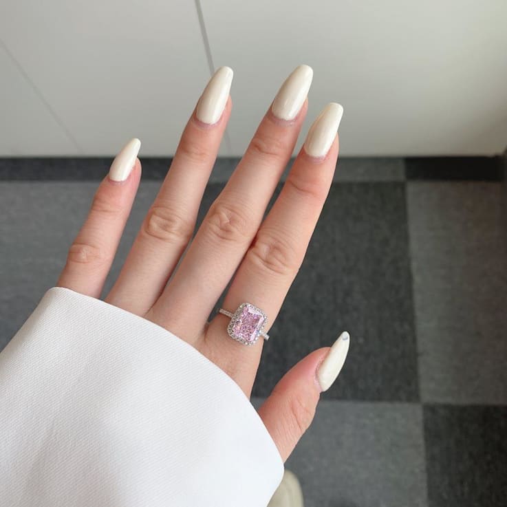 Radiant Cut Pink and Round White Cubic Zirconia Accents Sterling Silver
Halo Ring