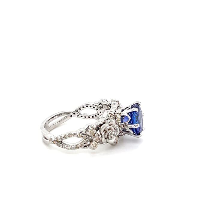 Round Tanzanite and White Diamond 10K White Gold Flower Ring