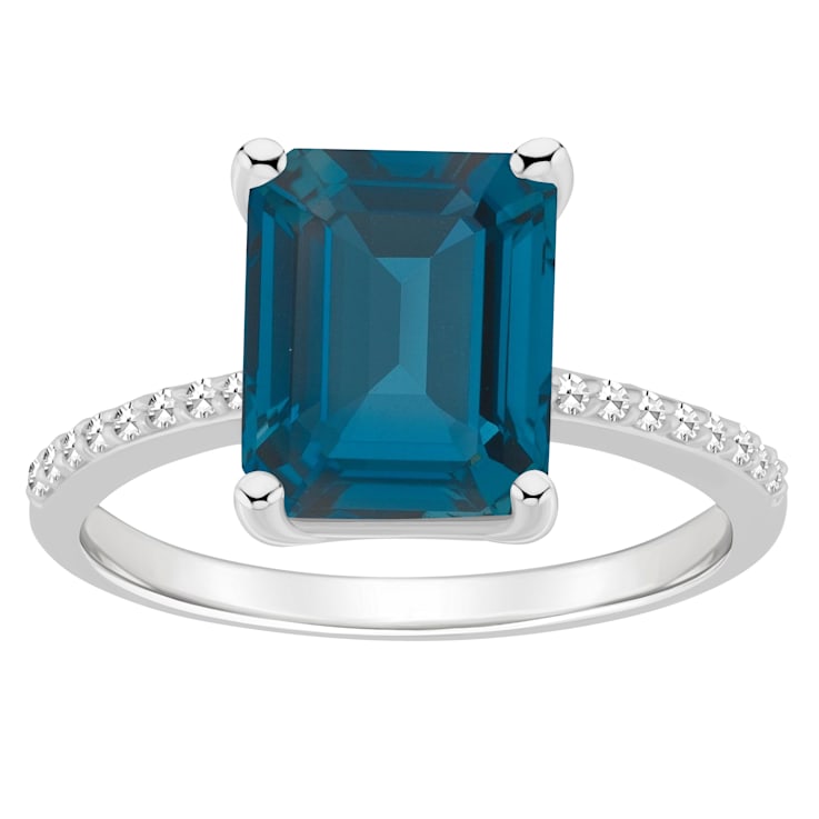 10x8mm Emerald Cut London Blue Topaz and 1/10 ctw Diamond Rhodium Over
Sterling Silver Ring