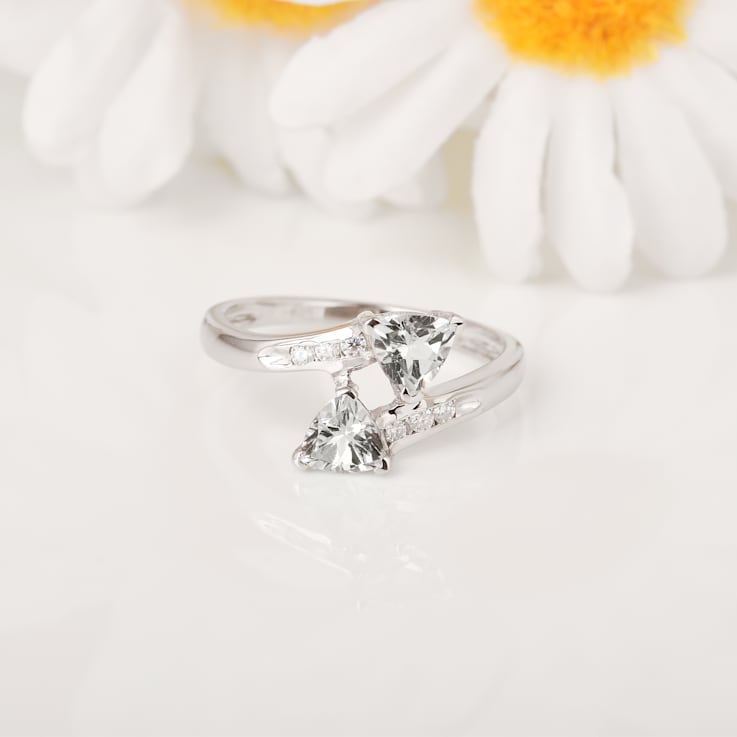 Trillion Aquamarine and White Topaz 2-Stone Rhodium Over Sterling Silver
Bypass Ring 1.22ctw