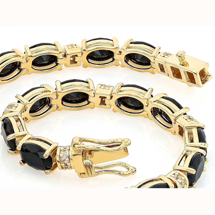 Black Spinel Oval And White Zircon Tennis Bracelet In 18K Gold Over
Sterling Silver 4.41ctw