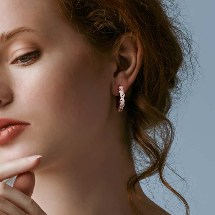 Diamond Accent Twist Hoop Earrings in 2-Tone Rose Gold and White
Sterling Silver