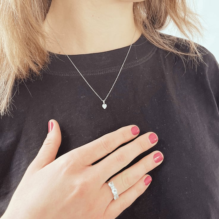 White Topaz and Moissanite Sterling Silver 3-Stone Ring