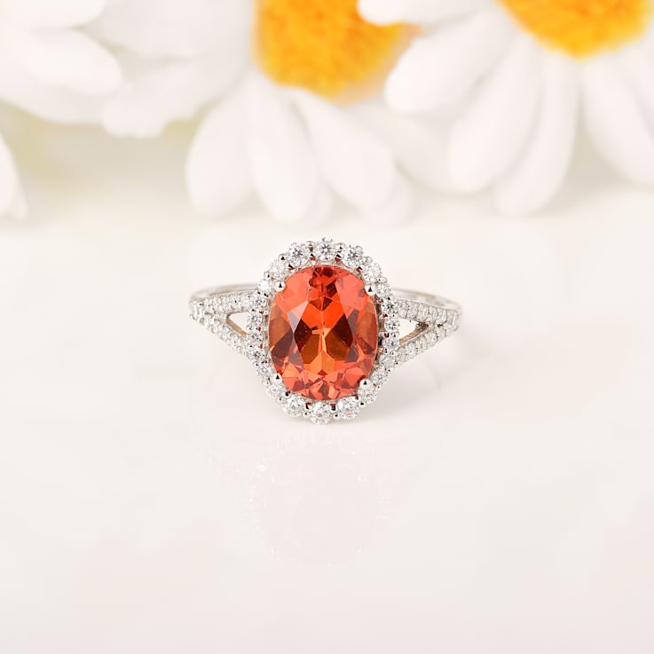 Peach Orange Lab Created Oval Padparadscha Sapphire Halo Ring in Rhodium
Over Sterling Silver