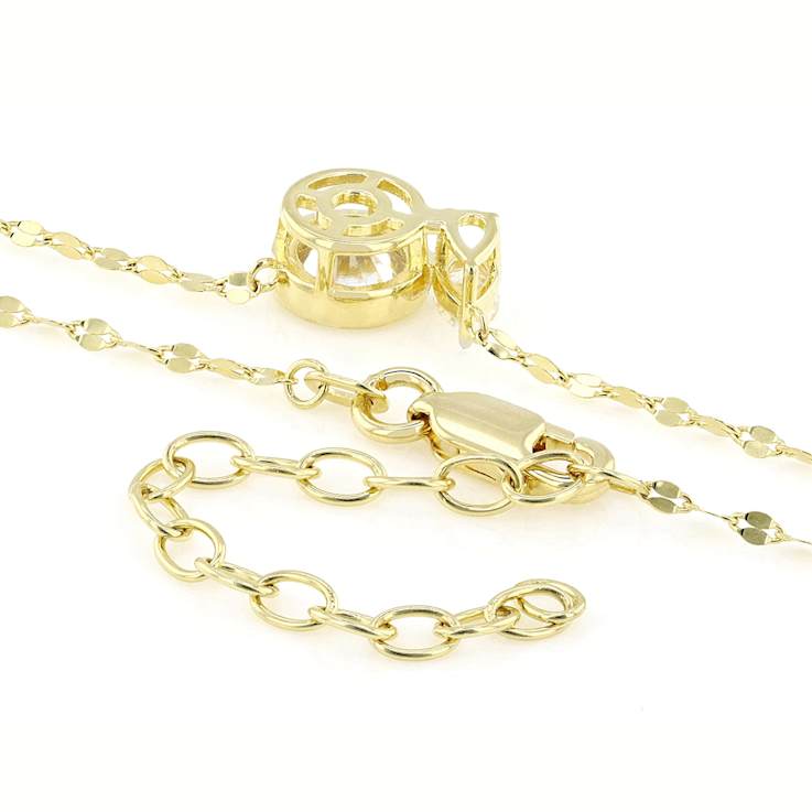 Bezel Set Round And Pear Moissanite Two-Stone Ring In 14K Gold Over
Sterling Silver