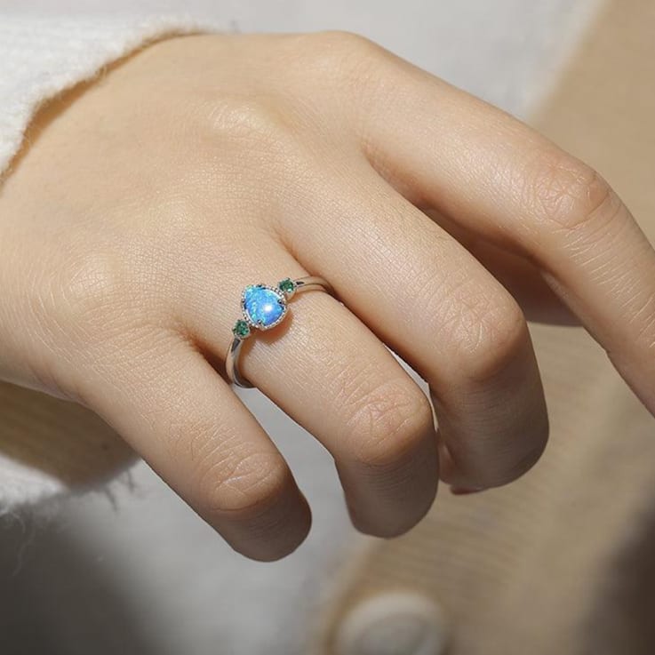 Pear Shape Lab Created Blue Opal and Round Green Nanocrystal Sterling
Silver Opal Ring 3-Stone Ring