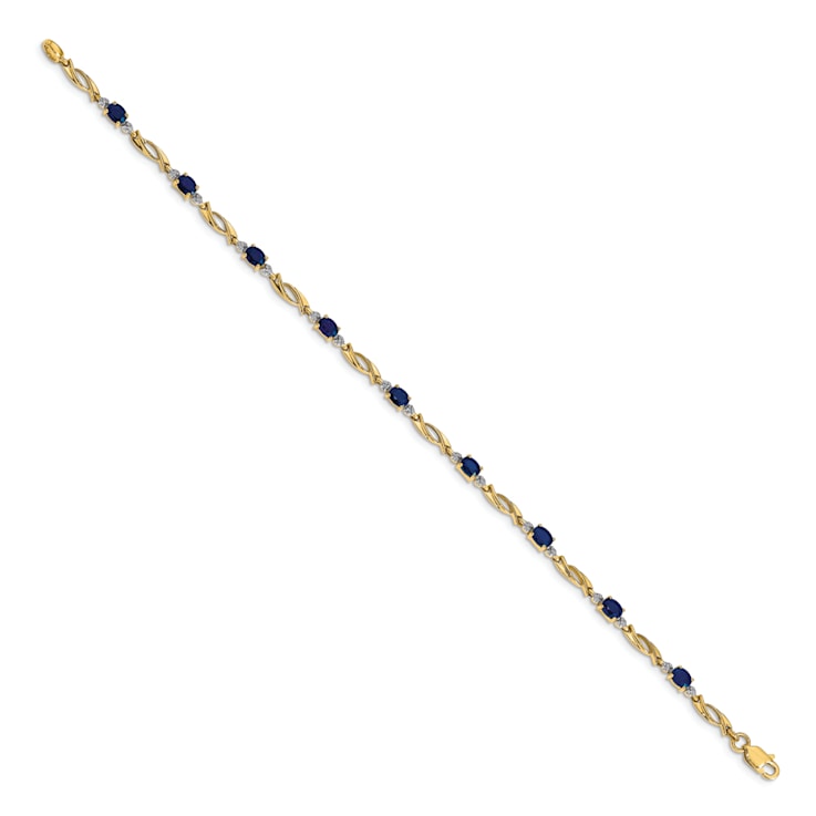 14k Yellow Gold and Rhodium Over 14k Yellow Gold Diamond and Oval
Sapphire Bracelet