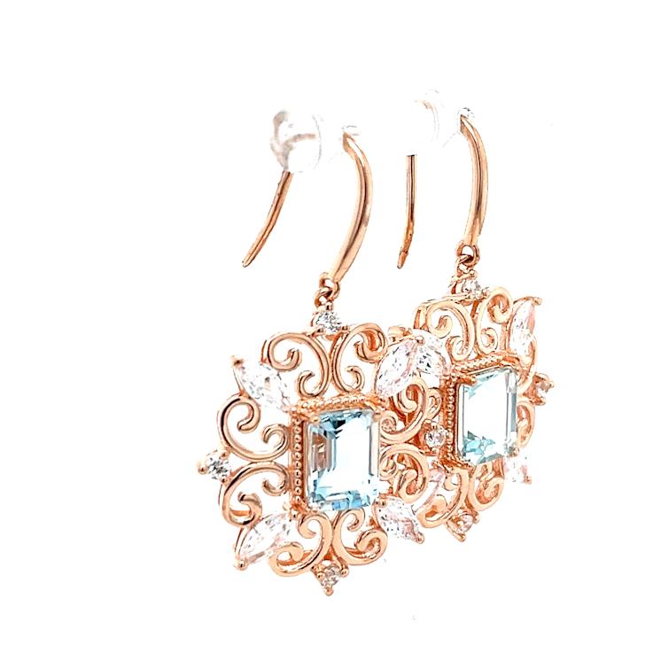 Aquamarine and White Cubic Zirconia 18K Rose Gold Over Sterling Silver
Earrings 3.20ctw