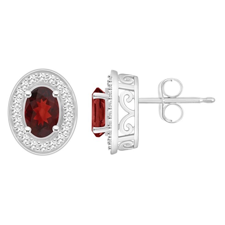 6x4mm Oval Garnet 1/5 ctw Diamond Rhodium Over Sterling Silver Halo Stud Earrings