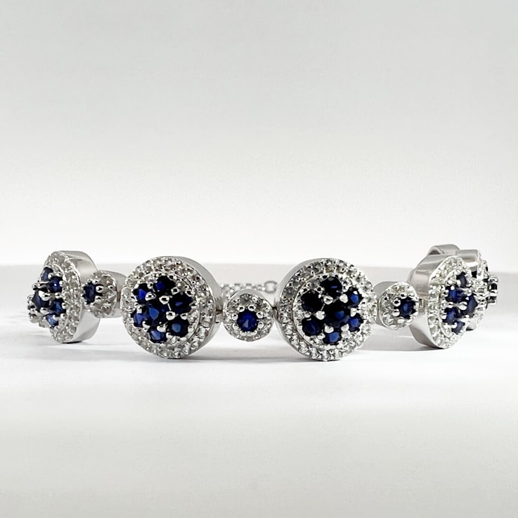 Lab Created Blue Sapphire and White Sapphire Halo Rhodium Over Sterling
Silver Sapphire Bracelet