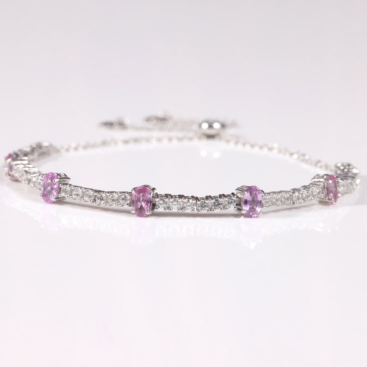 Rhodium Over Sterling Silver Oval Pink Sapphire and White Zircon Bolo
Bracelet 1.1ctw