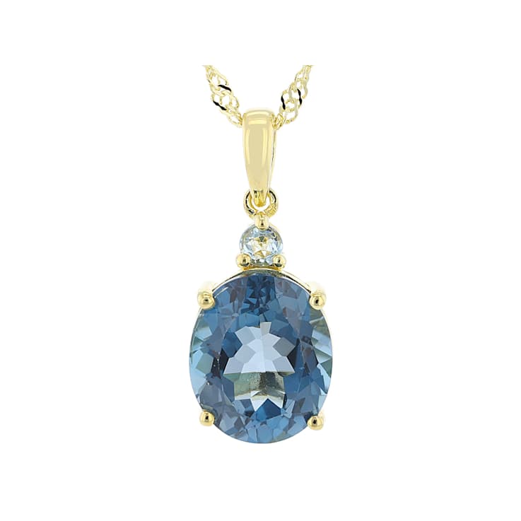 Blue Topaz And Swiss Blue Topaz Pendant Necklace In 18K Gold Over
Sterling Silver 5.72ctw