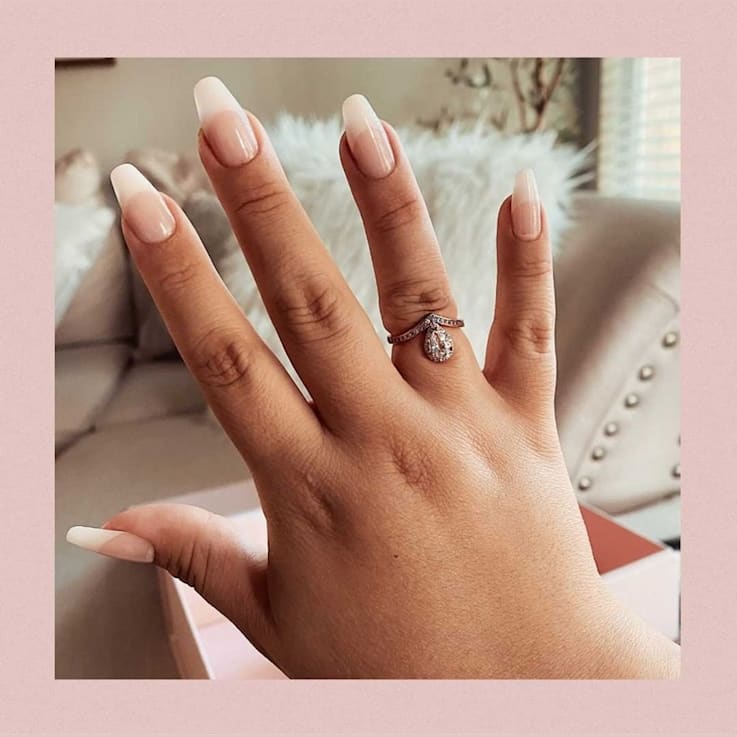 Pear Shape and Round White Topaz 14K Rose Gold Over Sterling Silver
Ring, 1.6ctw
