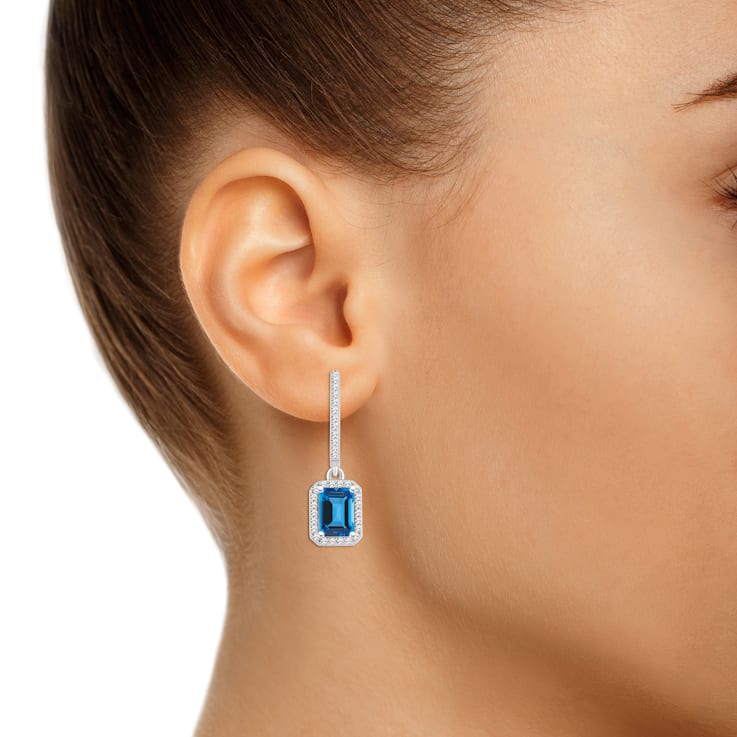 7x5mm Emerald Cut Blue Topaz 1 3 ctw Diamond Rhodium Over Sterling Silver Halo Dangle Earrings 1DRP4G