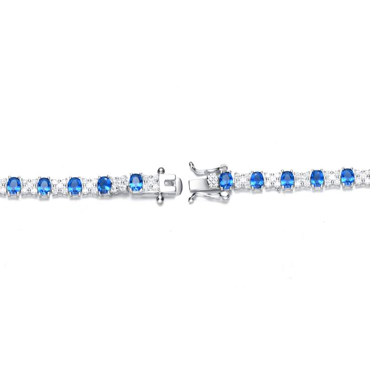 Sapphire Color CZ Tennis Bracelet In White Rhodium Over Brass
