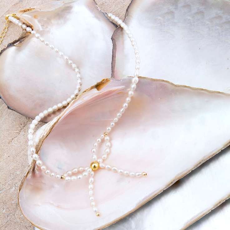Cultured Freshwater Pearl Bow Necklace with Gold-Tone Brass Accents