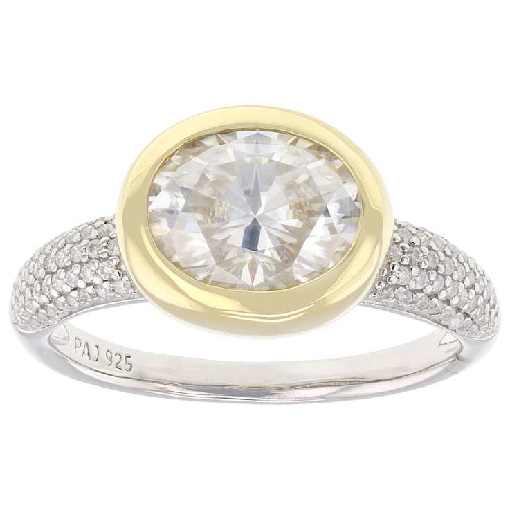 Bezel Set Two-Tone Moissanite Ring In Sterling Silver With 14K Gold Over
Silver Accent