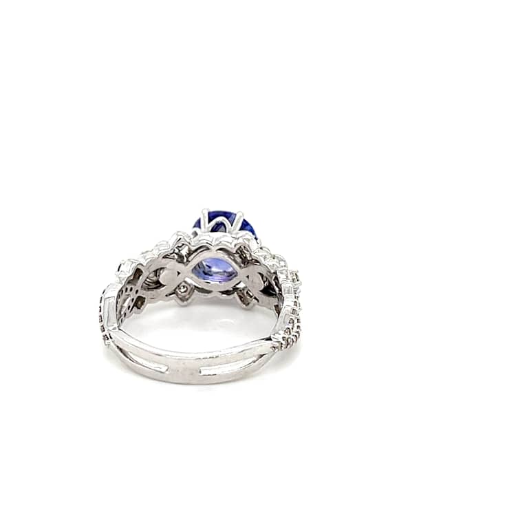 Round Tanzanite and White Diamond 10K White Gold Flower Ring