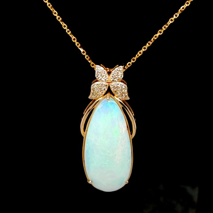 Ethiopian Opal Pear Shape Cabochon and Round Diamond 14K Yellow Gold
Pendant with Chain, 14.38ctw