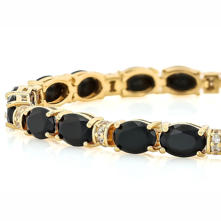 Black Spinel Oval And White Zircon Tennis Bracelet In 18K Gold Over
Sterling Silver 4.41ctw