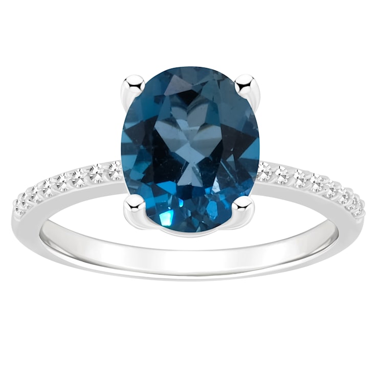 10x8mm Oval London Blue Topaz and 1/10 ctw Diamond Rhodium Over Sterling
Silver Ring