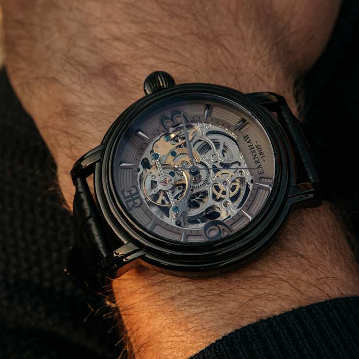 Thomas Earnshaw Longcase Automatic Gray Dial Black Stainless Steel Band
Skeleton Watch