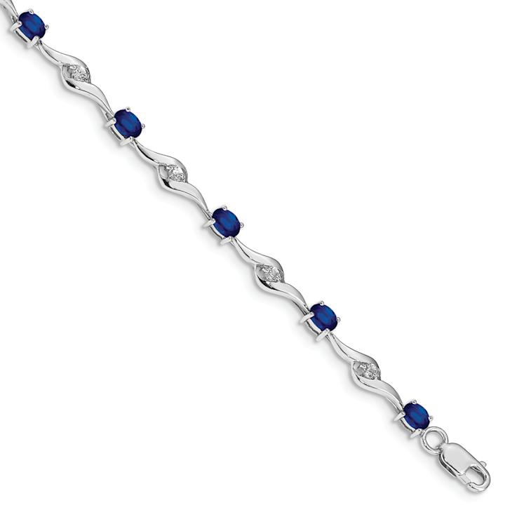 Rhodium Over 10k White Gold Oval Shaped Blue and Round Shaped White
Sapphire Bracelet