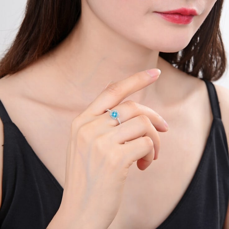 Lab Grown Diamond and Paraiba Blue Apatite Rhodium Over Sterling Silver
Cushion Cut Halo Ring