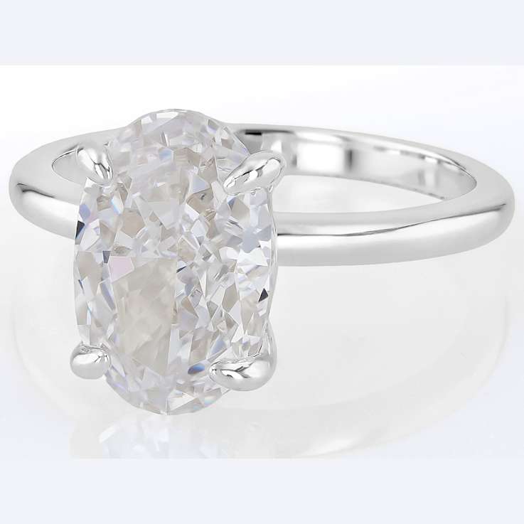 Oval CZ Solitaire Ring In Platinum Over Sterling Silver