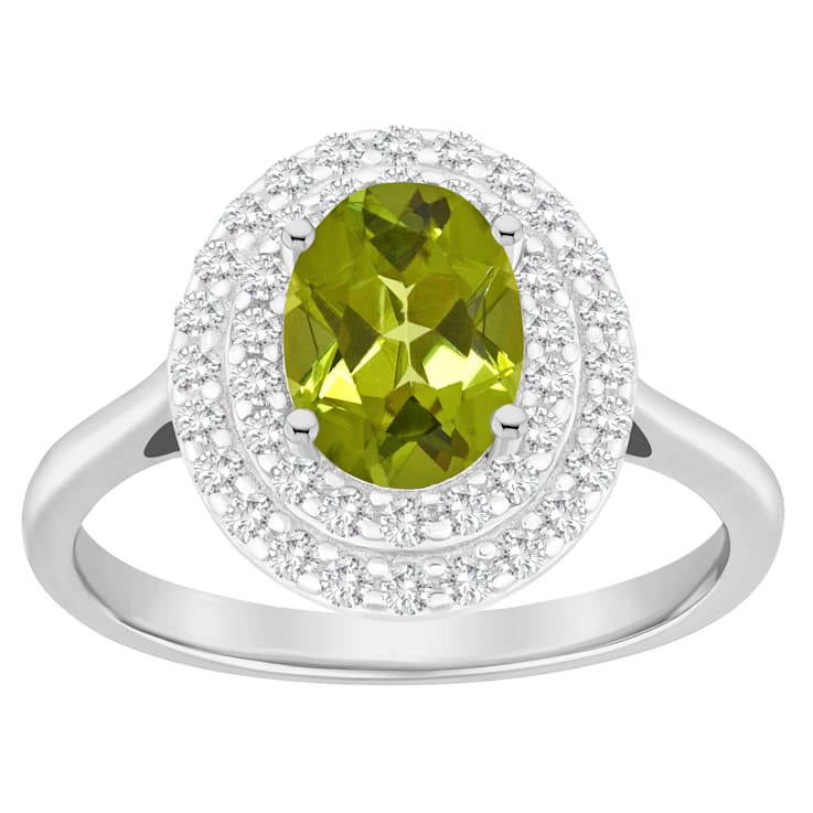 8x6mm Oval Peridot And White Topaz Accents Rhodium Over Sterling Silver
Double Halo Ring