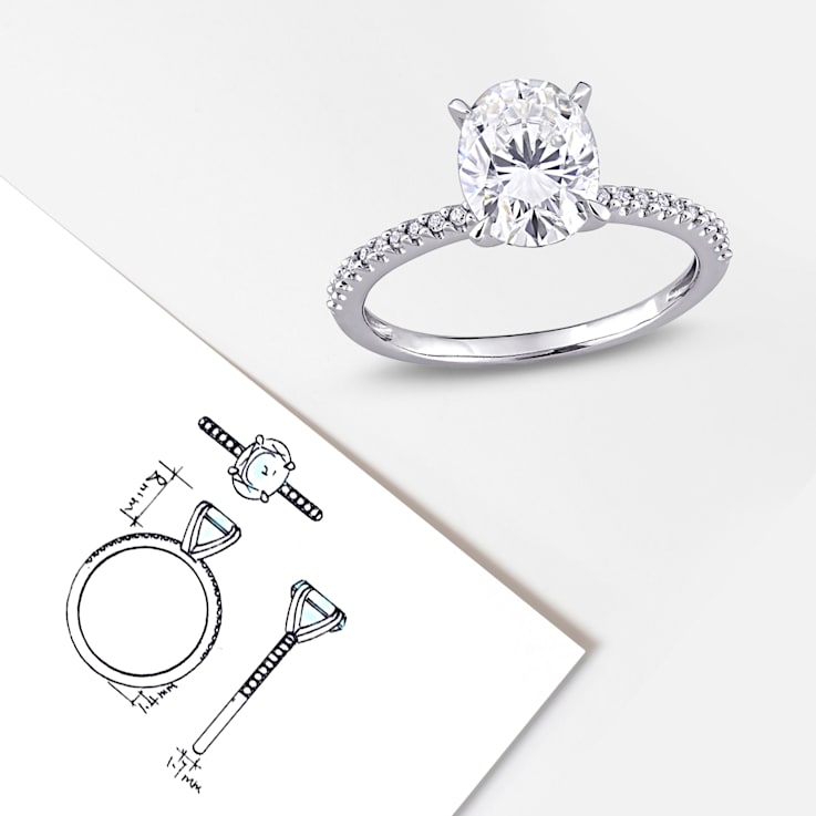 2 CT DEW Created Moissanite and 1/10 CT TW Diamond Engagement Ring in
14K White Gold