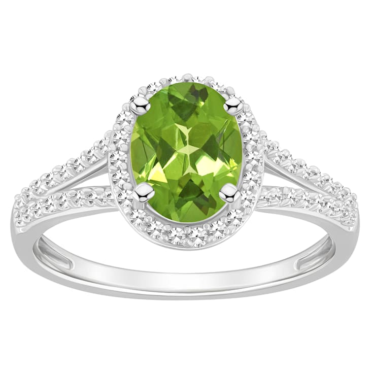 8x6mm Oval Peridot 1/4 ctw Diamond Rhodium Over Sterling Silver Halo Ring