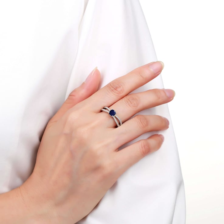 Round Blue Sapphire with White Sapphire Accents Sterling Silver Split
Shank Ring, 0.60ctw