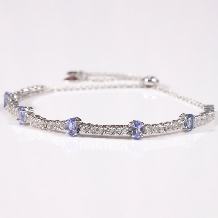 Rhodium Over Sterling Silver Oval Tanzanite and White Zircon Bolo
Bracelet 1.1ctw