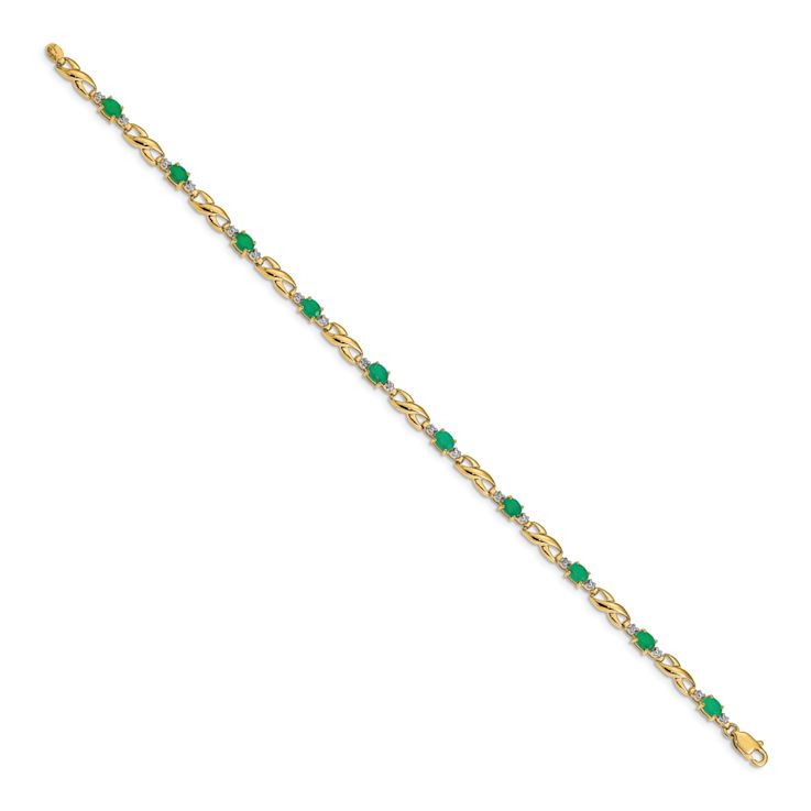 10k Yellow Gold and Rhodium Over 10k Yellow Gold Diamond and Oval
Emerald Bracelet