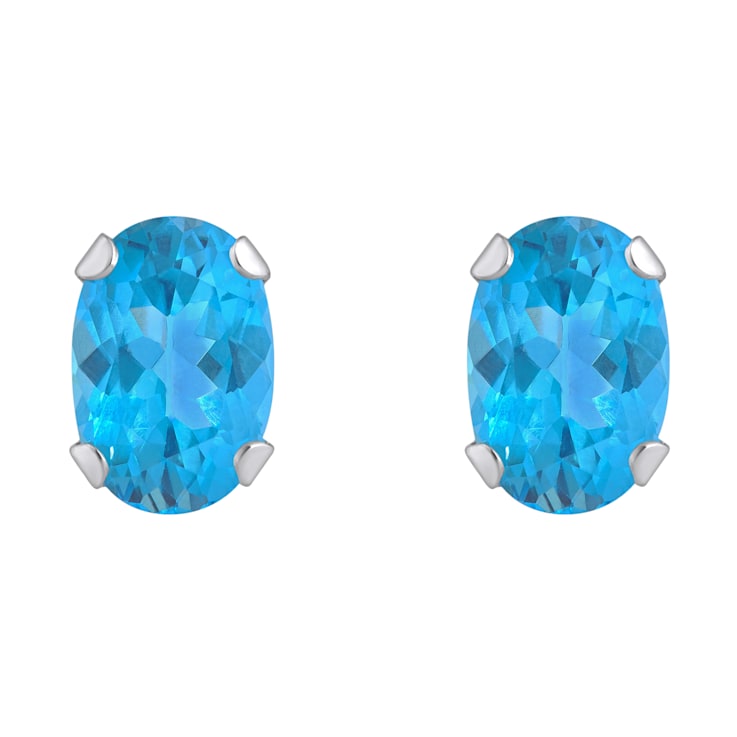 6x4mm Oval Blue Topaz Rhodium Over 10k White Gold Stud Earrings
