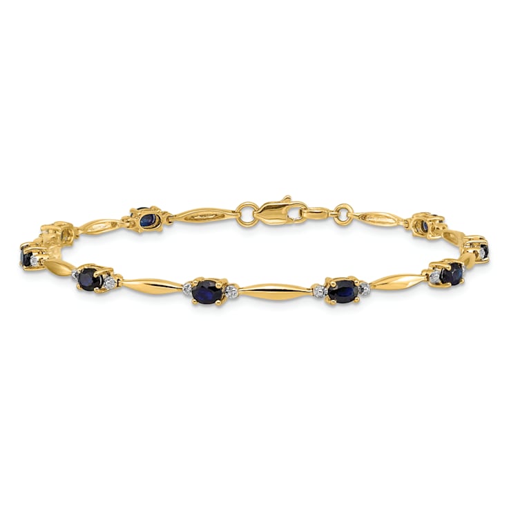 14k Yellow Gold and Rhodium Over 14k Yellow Gold Diamond and Oval
Sapphire Bracelet
