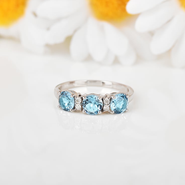 Blue Topaz Rhodium Over Sterling Silver Round Moissanite 3-Stone Ring