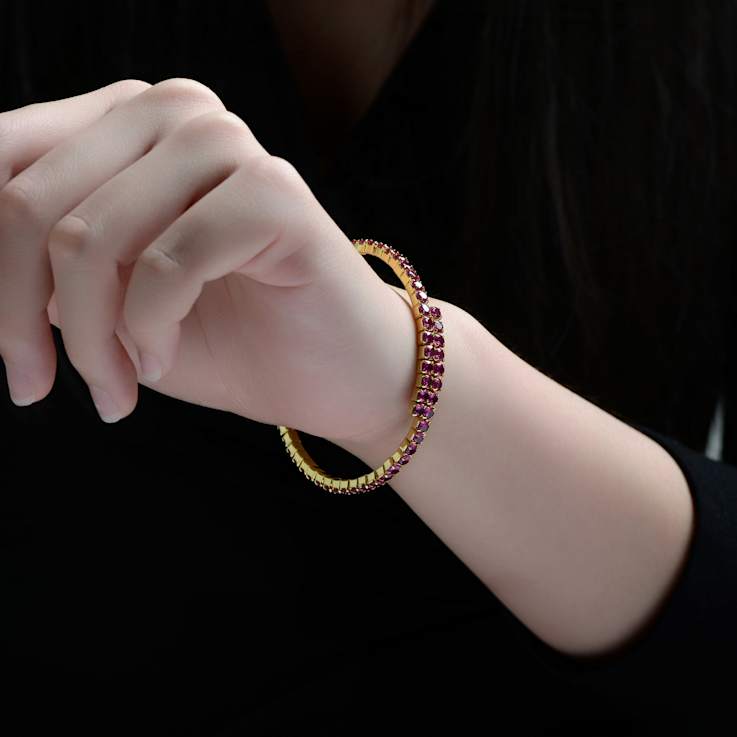 Ruby Color CZ Bypass Tennis Bracelet In 14K Gold Over Brass