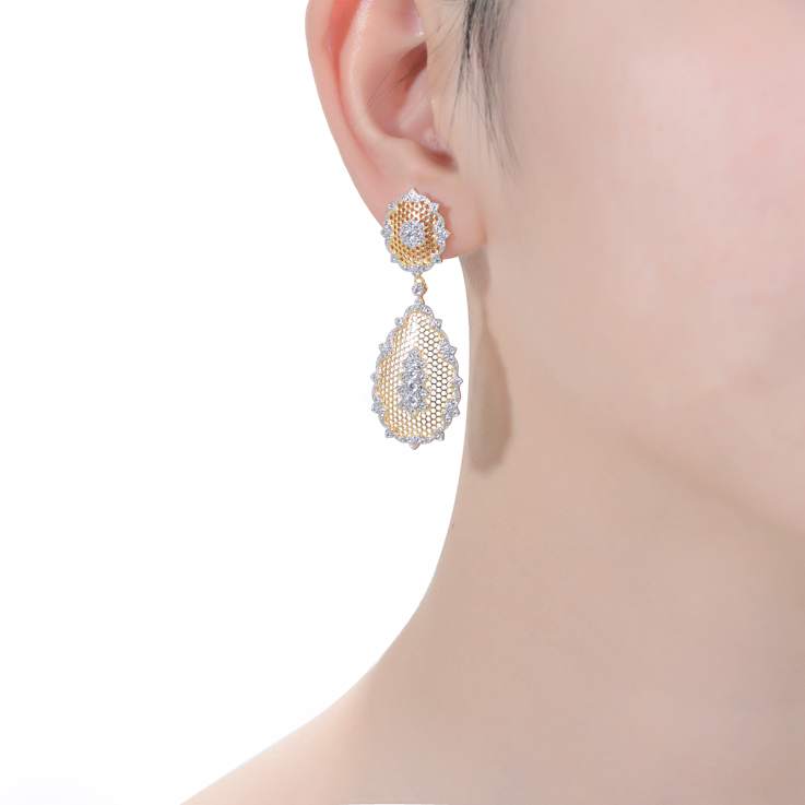 Pear Shape CZ Two-Tone Drop Earrings In 14K Gold Over Brass And Rhodium
Over Brass