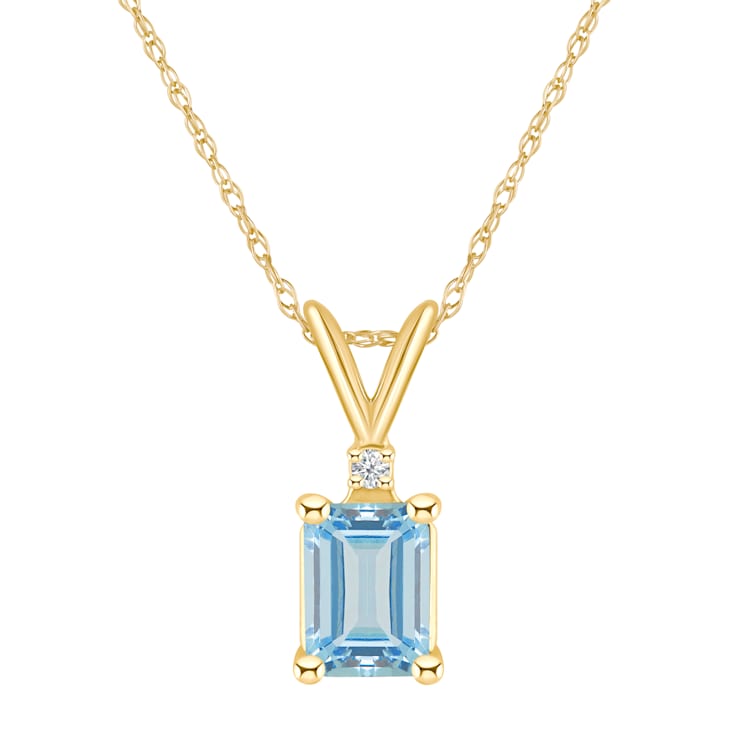 7x5mm Emerald Cut Aquamarine with Diamond Accent 14k Yellow Gold Pendant
With Chain