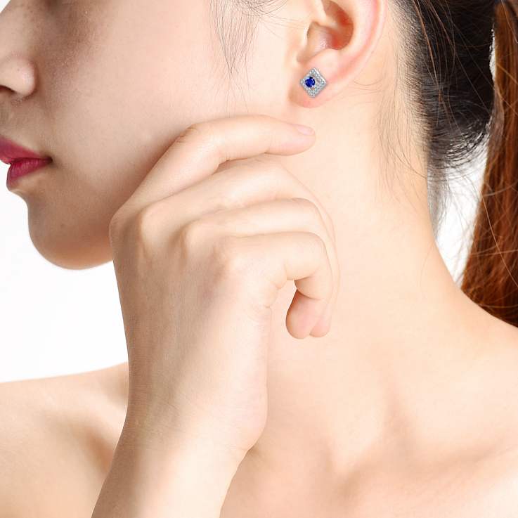 Sapphire Color CZ Halo Stud Earrings In Rhodium Over Brass