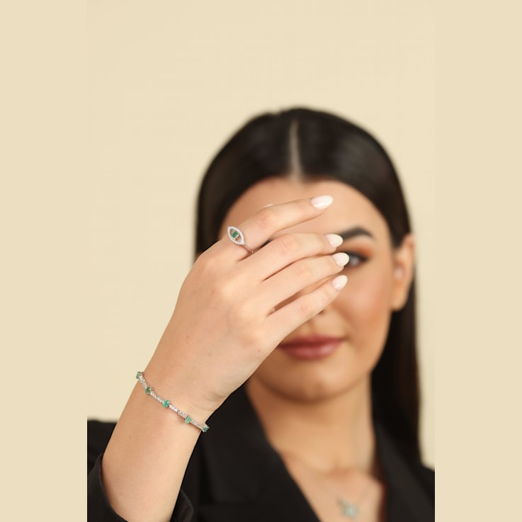 Emerald with Moissanite Accents Rhodium Over Sterling Silver Evil Eye
Halo Ring