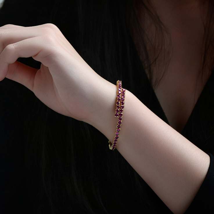 Ruby Color CZ Bypass Tennis Bracelet In 14K Gold Over Brass
