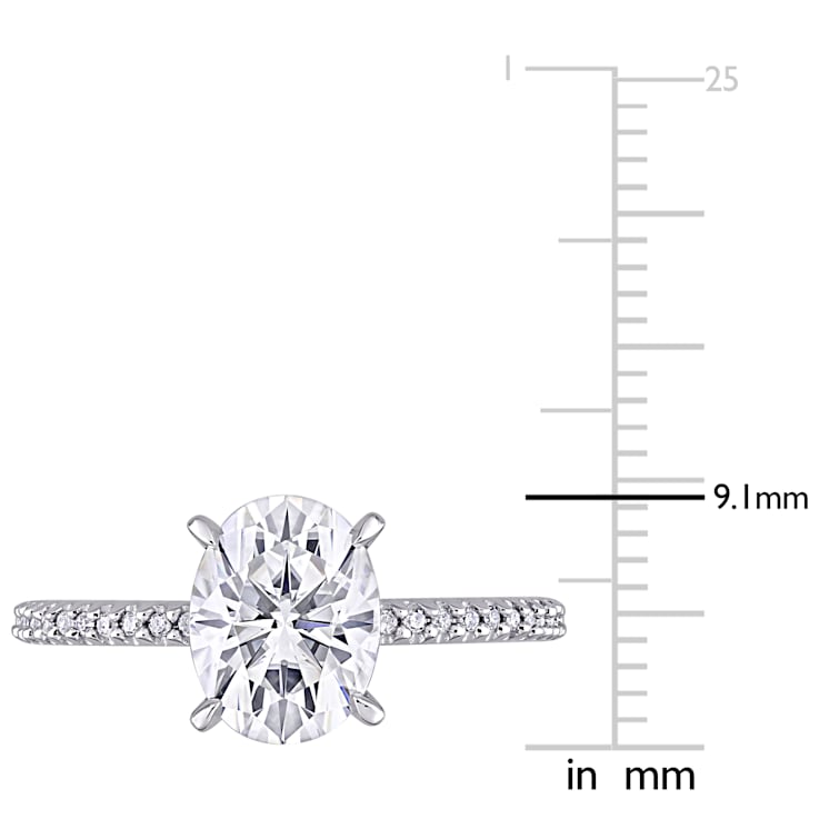 2 CT DEW Created Moissanite and 1/10 CT TW Diamond Engagement Ring in
14K White Gold